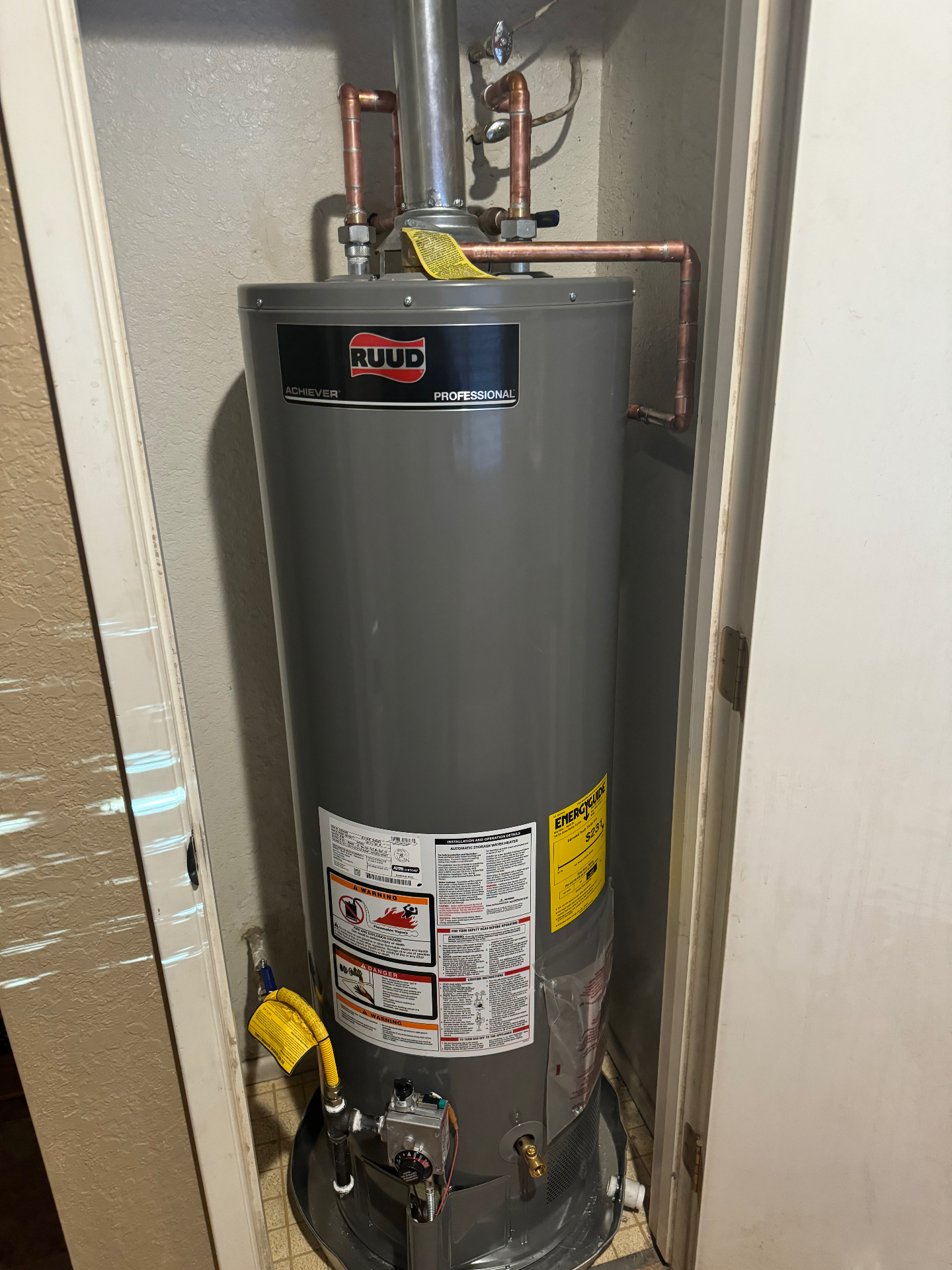 Professional Ruud water heater installation by Priority Rooter & Plumbing in Tucson